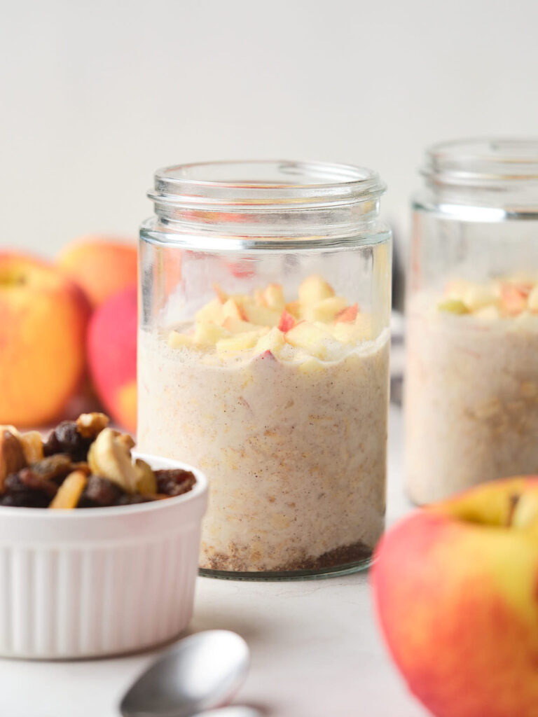 Two glass jars filled with cinnamon overnight oats.