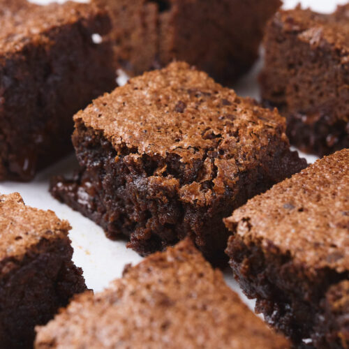 Close-up of pumpkin brownies, each cut into square pieces.