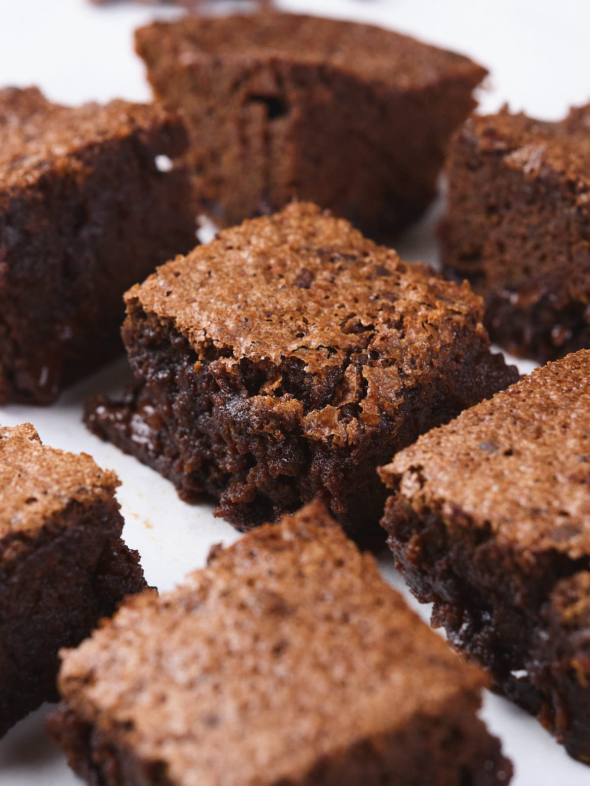 Close-up of pumpkin brownies, each cut into square pieces.