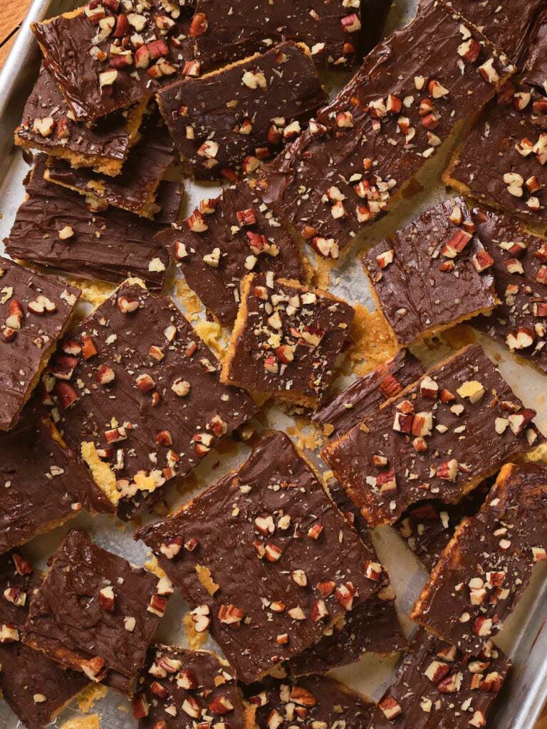 Tray of saltine toffee squares with a buttery toffee base.