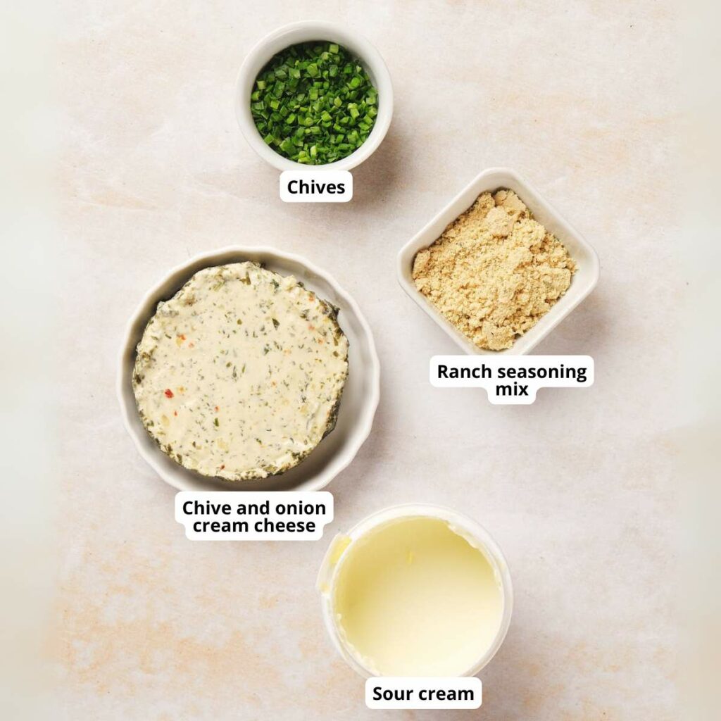 Ingredients for chip dip on a light colored surface.