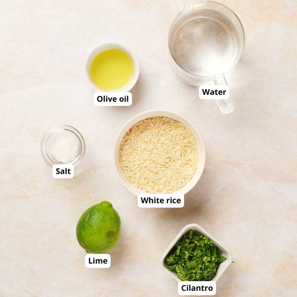 Ingredients for cliantro lime rice labeled on a countertop.