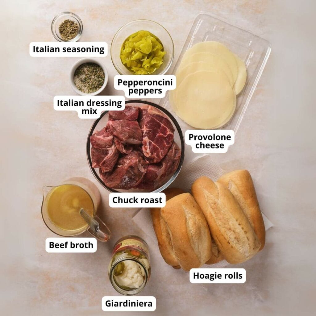 Ingredients for italian beef sandwich displayed on a table.