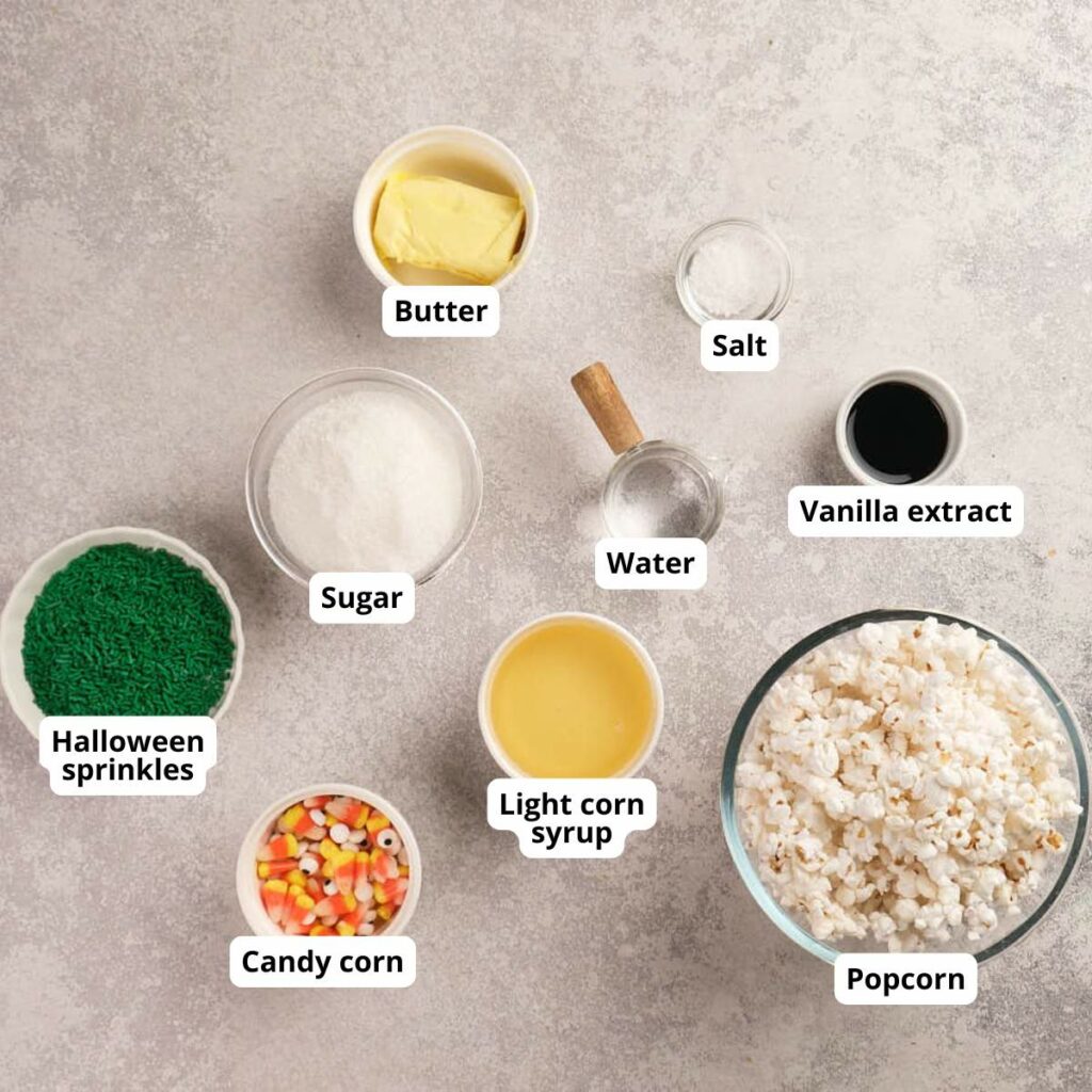 Top-down view of labeled ingredients of popcorn balls on a light surface.