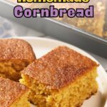 Three pieces of homemade cornbread are served on a white plate, with a baking pan of cornbread visible in the background.